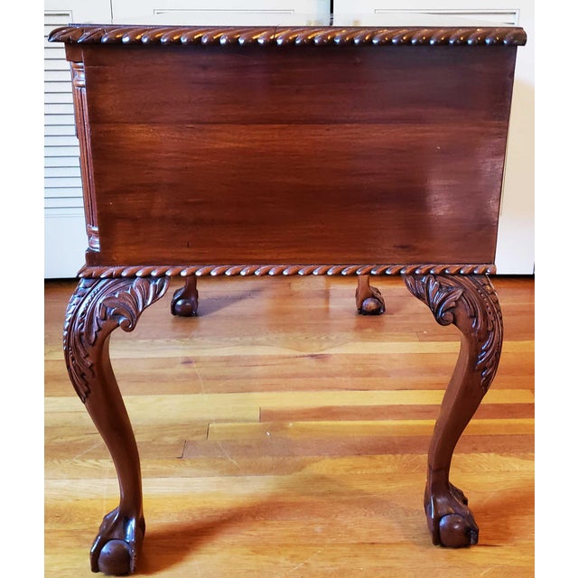 American Centennial dressing table of modified Chippendale style, having a gadrooned thumb moulded top on a plain case...