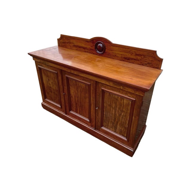 Beautiful Victorian-era sideboard, England, circa 1850. Three doors. Excellent condition. Solid mahogany. Dimensions:...