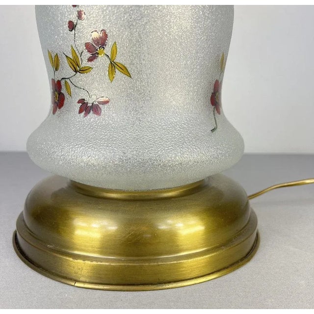 Vintage spring milk glass floral table lamp Stunning lamp with flower paintings and brass elements. 1 bulb (not included )...