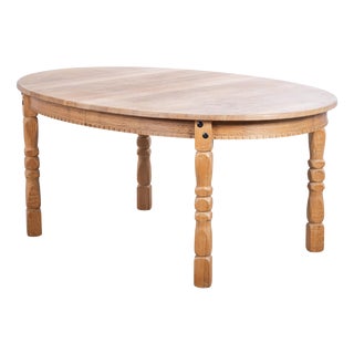 Brutalist Oval Oak Dining Table from Henning Kjærnulf, Denmark, 1960s For Sale