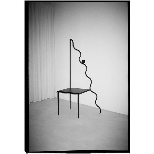 The Descending Chair by Valeria Vasi Materials: Oak Dimensions: D 67 x W 41 x H 145 cm. The Descending Chair emerges as a...