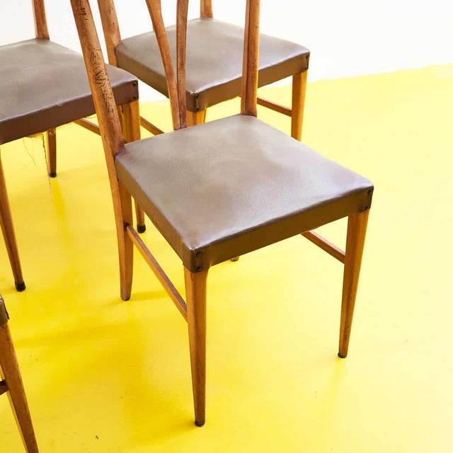 1950s bentwood and faux leather chairs, six pieces Height: 94 Width: 41 Depth: 42 Seat height: 48 Style: VINTAGE...