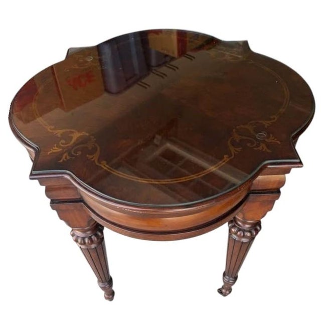 Expertly crafted from rich birch and exotic zebrano wood with a protective glass top to match. Exquisite Artistry:...