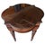Expertly crafted from rich birch and exotic zebrano wood with a protective glass top to match. Exquisite Artistry:...
