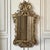 A 19th century Italian neoclassical giltwood mirror, hand carved and finished in a warm, softly burnished gold that...
