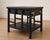 Elevate your space with this beautifully refinished vintage campaign-style end table, blending timeless craftsmanship with...