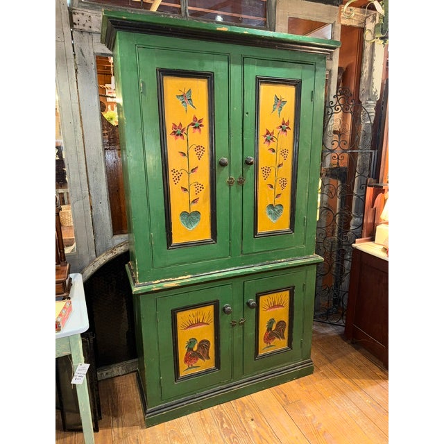 Bring whimsical farmhouse character into your space with this stunning Antique cupboard. Finished in a rich earthy green...