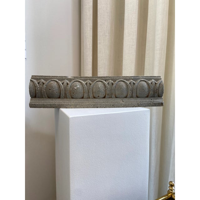 Architectural remnant with egg and dart design. Date is unknown but egg and dart motif originated with classical...