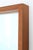 Minimalist Danish wall mirror. 1960s/1970s. High-quality craftsmanship. Solid teak frame. Pleasant, smooth, satin-matte...
