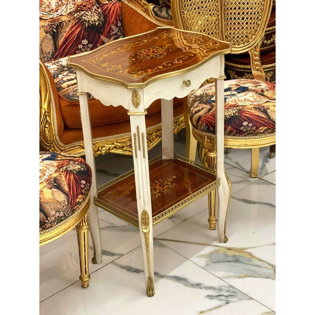 Bring timeless French sophistication into your home with this exquisite Louis XVI accent side table. Expertly handcrafted...