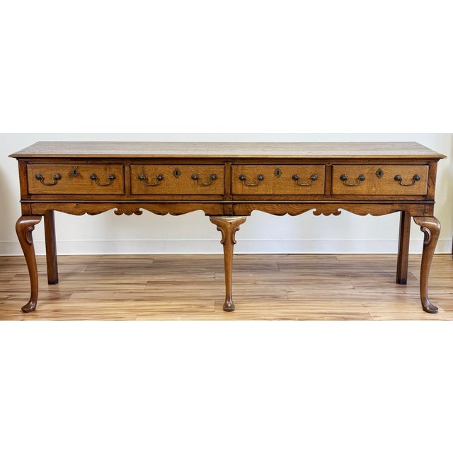 Substantial vintage Queen Anne style console table with rich natural medium wood finish. Quite long with wonderful...