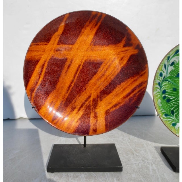 A fine pair of enamel trays in abstract design and delicate feather swirls. A mid-century art that produced many wonderful...