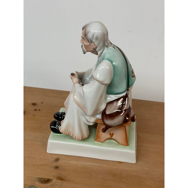 Design Plus Gallery presents Man Whittling Figurine by Zsolnay in Pecs. This is a highly collectible, vintage hand-painted...