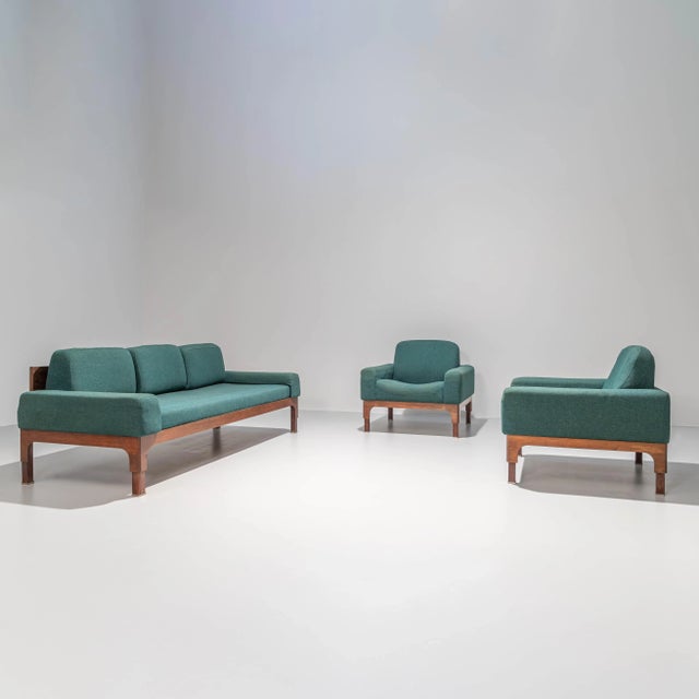 ‘Romantica’ Living room set by Piero Ranzani for Elam in dark Wood and Walnut, Italy, 1950’s What stands out are the...