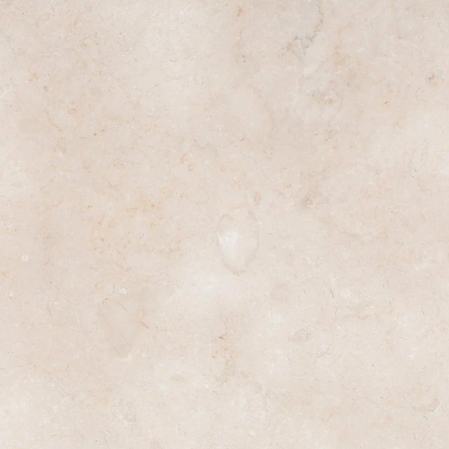 Contemporary round coffee table featuring a thick cream-toned marble top with a beautifully grained oak wood base. The...