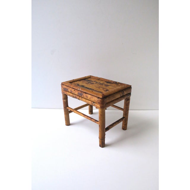A small, well-made wicker bamboo stool, circa mid-20th century. A great piece for a drink, plant, small books, etc....