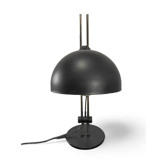 In very good condition for its age. 1960s black painted metal and steel produced in Italy by Gammalux, in perfect working...