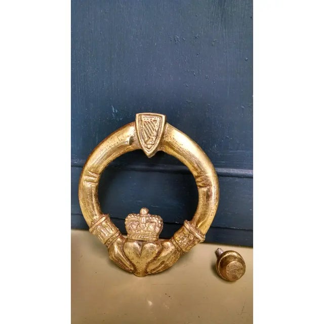 Vintage Irish Brass Claddagh Door Knocker A charming vintage Irish Claddagh door knocker, finely cast in solid brass and...