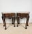 Elegant pair of French Louis XV-style nightstands crafted in wood, each featuring a shaped marble top, a serpentine...