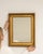 A mirror whose gold gilt textured frame, rectangular gives it real character at first glance. The piece dates to 19th...