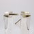 Pair of Silver Interlocking Carafes designed by Mario Botta for Cleto Munari, maker's mark for Rossi & Arcandi, Vicenza...