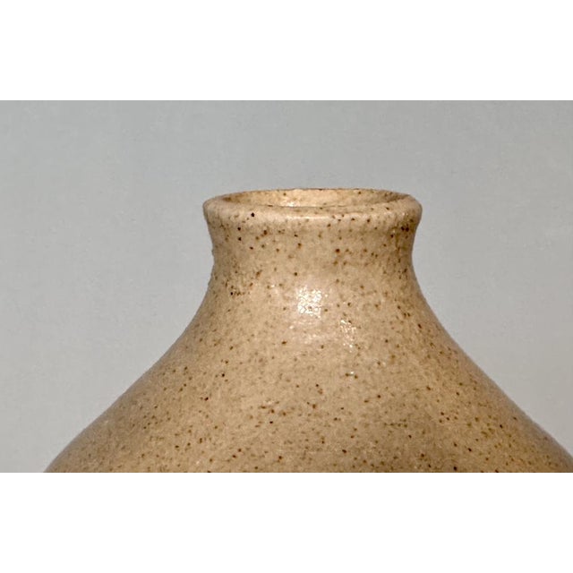 An impressive modernist studio ceramic art vase, whose design is reminiscent of ceramic vessels from ancient times, glazed...