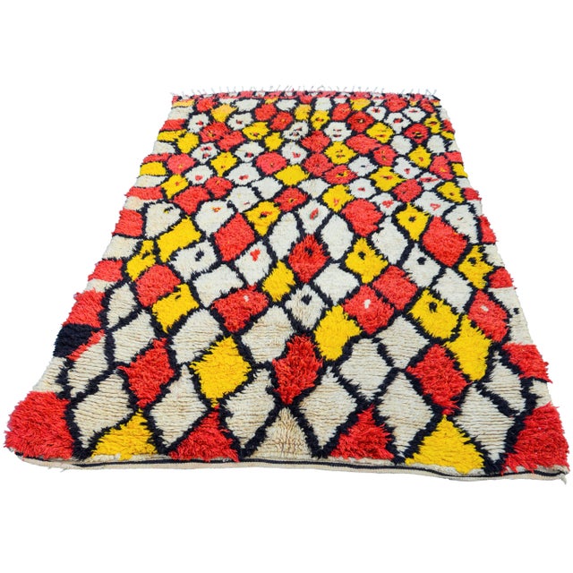 One-of-a-kind hand-knotted Moroccan rug in soft, organic wool featuring an ornate pattern of Berber diamonds and lozenge...