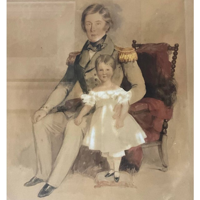 I love this! It is a framed English sea captain with his child dating to approximately 1850. It is a watercolor on paper....