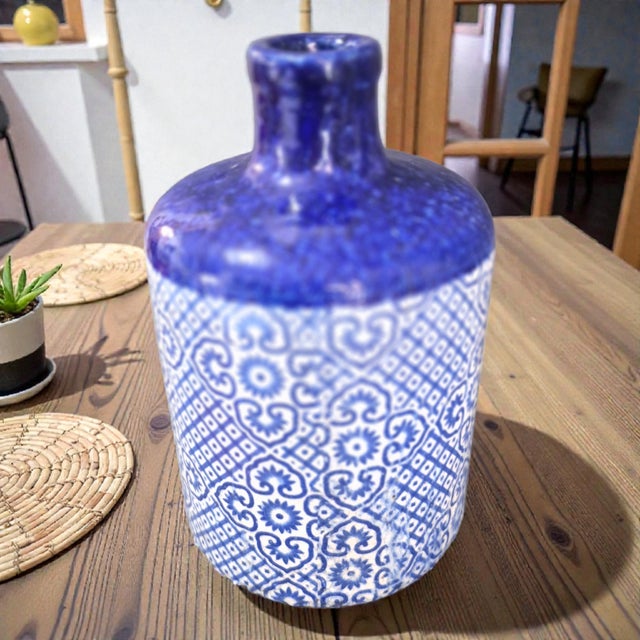 This Vintage Spanish Blue & White Glazed Heavy Earthenware Pottery Vase by Pablo Azulejo stands at 10.75'' high, making it...