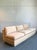 Embrace the sophisticated lounge aesthetic of this exceptional vintage sofa. A stunning example of 1980s design, this...