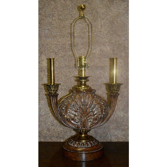 This Table Lamp has a Tuscan Style. The Base is made of Composite & Brass. Carved Leaf Design. No Shade. The Measurements:...