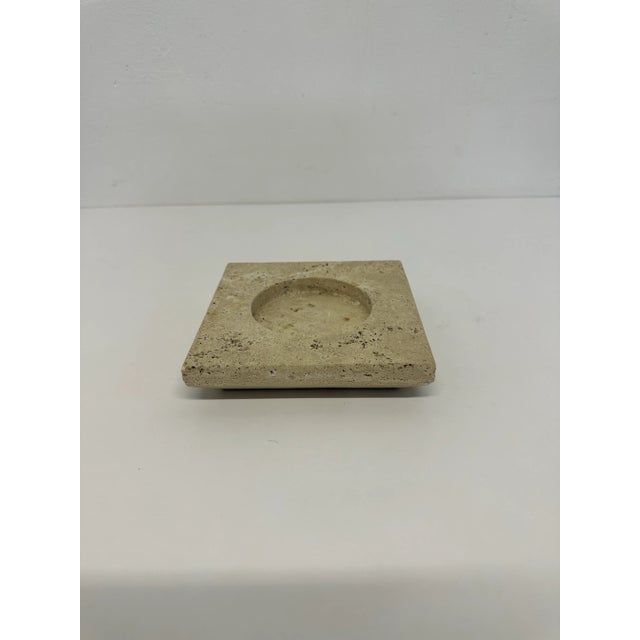 Italian travertine ash tray or catchall circa 1970s. The bottom of travertine has a suede table top protector.