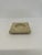 Italian travertine ash tray or catchall circa 1970s. The bottom of travertine has a suede table top protector.