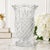 Graceful and sculptural, this substantial vintage crystal-glass vase draws inspiration from the classic pineapple—a...