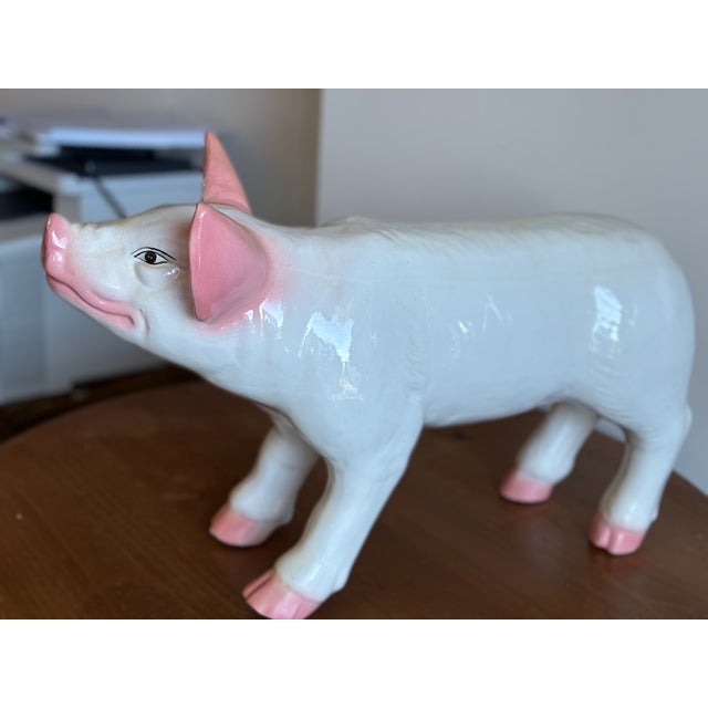 Crafted, circa mid century the very large pig figure is colorful, expressive, detailed, and realistic in shape and...