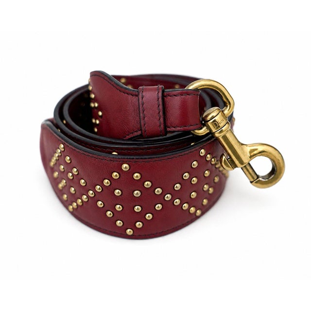 Authentic Christian Dior Lady Dior burgundy studded lambskin leather medium tote featuring signature Cannage stud...
