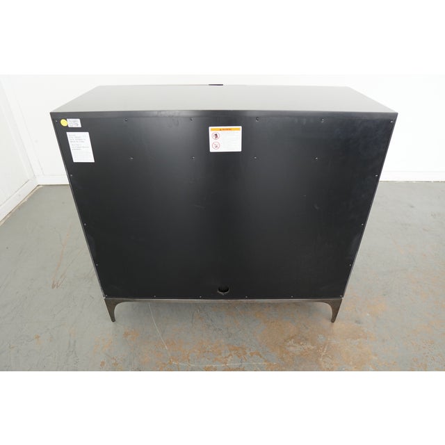 With the utmost attention to detail, craft and functionality, this bar cabinet evokes the rhythmic flow of traffic in and...