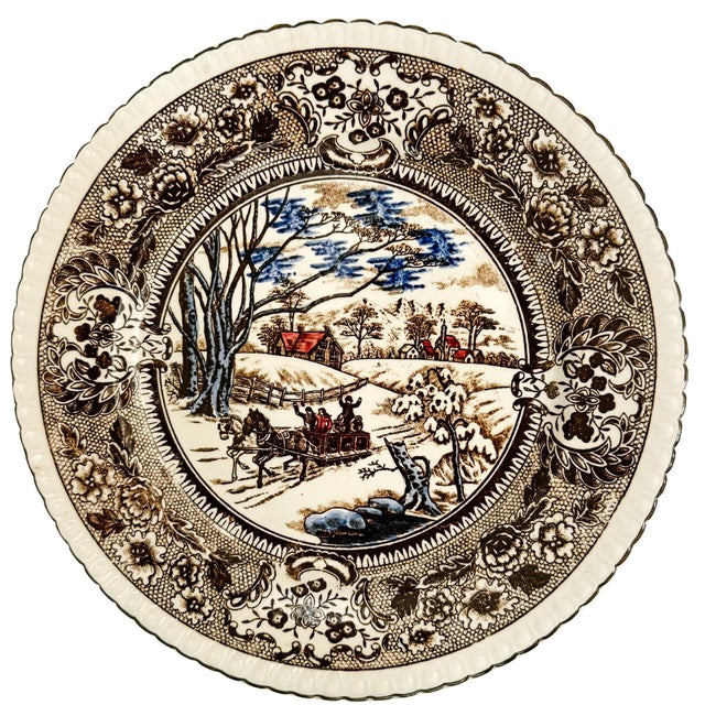 Embrace vintage winter nostalgia with this charming set of 8 transferware dinner plates by Chase Import. Featuring a...