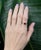 A sleek open band ring accented with sparkling natural Diamond details for a modern yet timeless look. Crafted in solid...