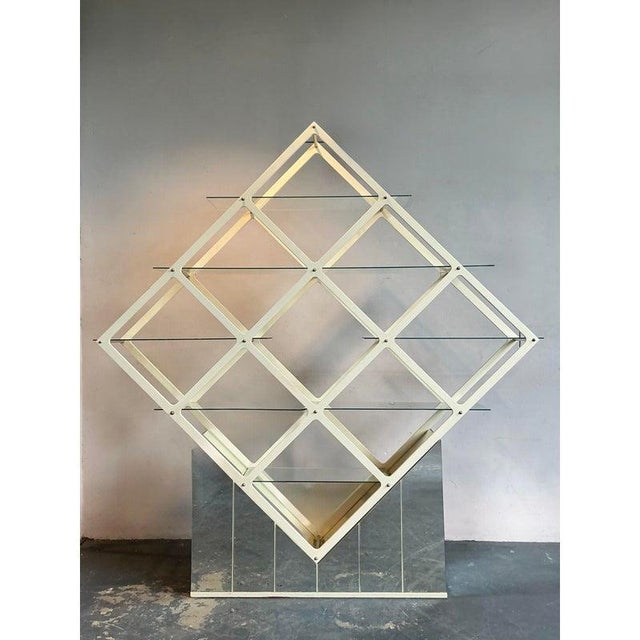 Elevate your interior with this striking Vintage Mid-Century Modern Diamond Etagere, a true statement piece that embodies...