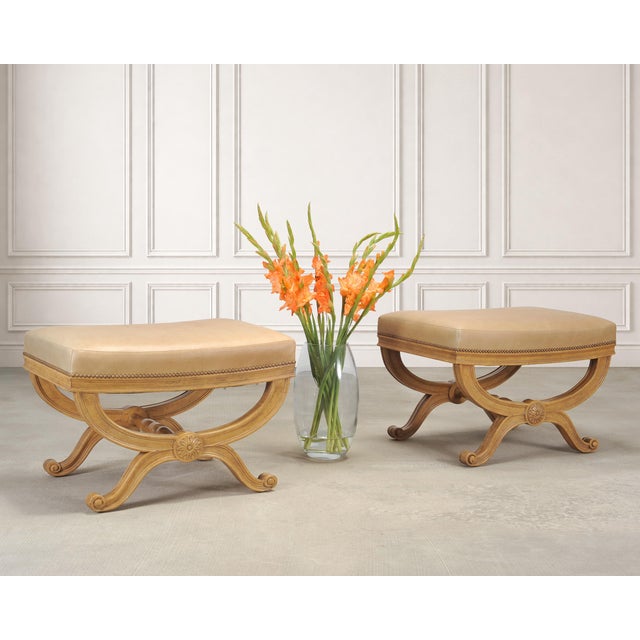 A handsome labeled pair of Neoclassical curule-form "d'Orsay" bench seats or ottomans designed by Michael Taylor, San...