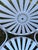 This listing is for an authentic pair of vintage François Carré style "Sunburst" (or Pinwheel) spring steel garden...