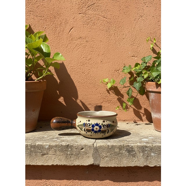 This is a vintage Netzi Mexican folk art pottery pitcher or ladle pot. Handcrafted stoneware pottery with a rustic, glazed...
