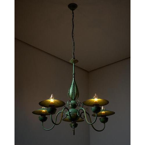 A striking piece with a faux green brass finish. Its captivating forms and aesthetics are enhanced by charming little...