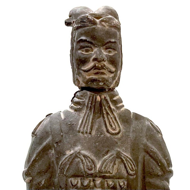 Three piece set of Chinese terracotta warriors. Replica of ancient figures found by archeologists in tomb excavations....
