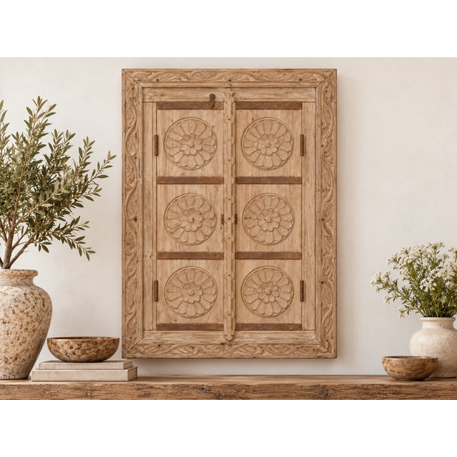 Invite a piece of ancient artistry and serene beauty into your home with this magnificent antique finely carved window,...
