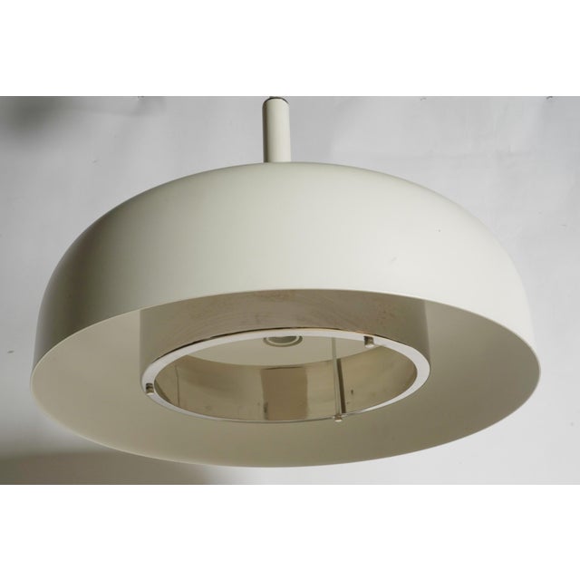 A Contemporary Ceiling Pendant Light Fixture white-painted metal Dimensions: 30 x 19 3/4 in. (76.2 x 50.2 cm.)