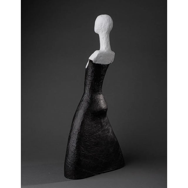 Grace (Elegant) by Chicago artist Nancy Pirri. Black and white contemporary sculpture of figure in dress.