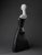 Grace (Elegant) by Chicago artist Nancy Pirri. Black and white contemporary sculpture of figure in dress.