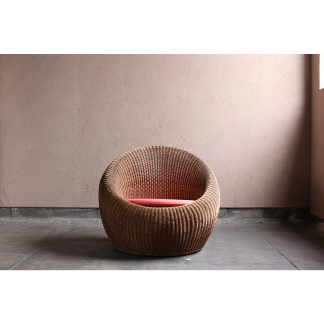 Rattan sofa designed by Isamu Kenmochi and manufactured by Yamakawa Rattan. Circa 1960s. No restorations or modifications...